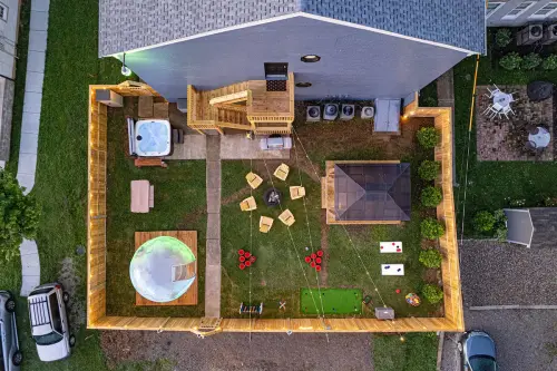 Discover ultimate luxury in this Backyard Oasis: Never-seen-before Dome, Hot tub, firepit, swing, gazebo, grill, putting green, and endless fun games!